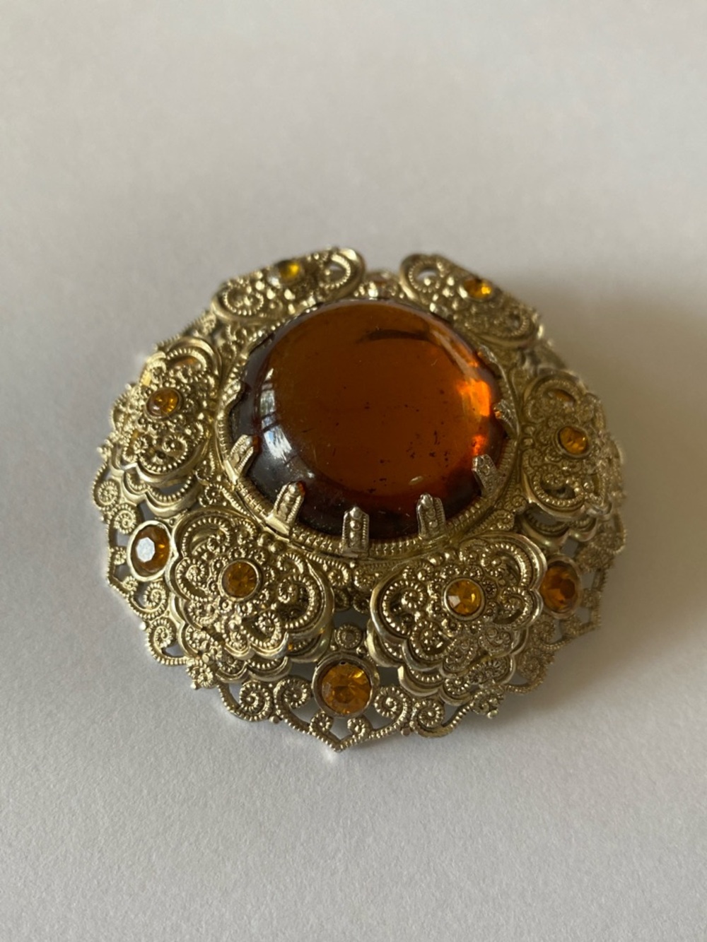 Western Germany Stamped Lightweight Filigree Amber Cabochon Rhinestone Brooch